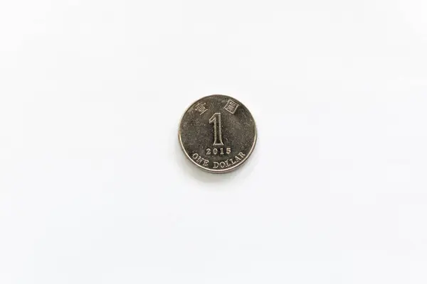 1つの香港ドル硬貨は白地に隔離された ビジネスや金融の概念は — ストック写真