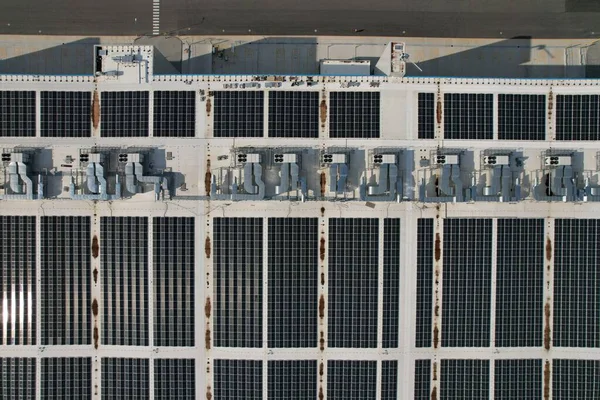 stock image Modern solar power plant, photovoltaic panels green energy electricity production,new power plant,European energy crisis 2022, green deal,Czech republic,European Union,aerial panorama from foggy cloud