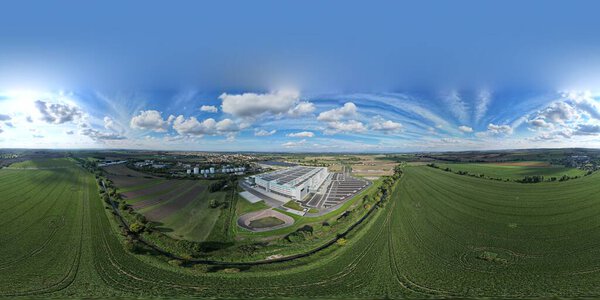 KOJETIN,Czech republic-September 24 2022:Brand new huge Amazon Warehouse distribution center exterior. Aerial view of massive sort and distribute logistics center,Europe,Kojetin Czech solar powerplant