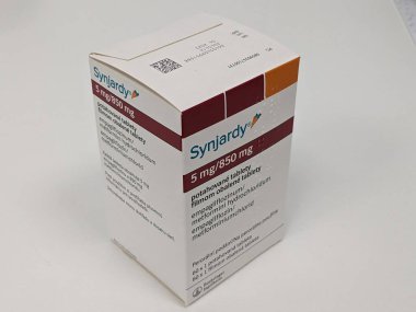 Prague,Czech Republic-August 27 2024: SYNJARDY box of medication with EMPAGLIFLOZIN active substance by BOEHRINGER INGELHEIM,used for treatment of type 2 diabetes,heart failure clipart