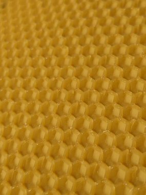 Sarı balmumu bal peteğinin soyut arkaplan veya doku arkaplanı.