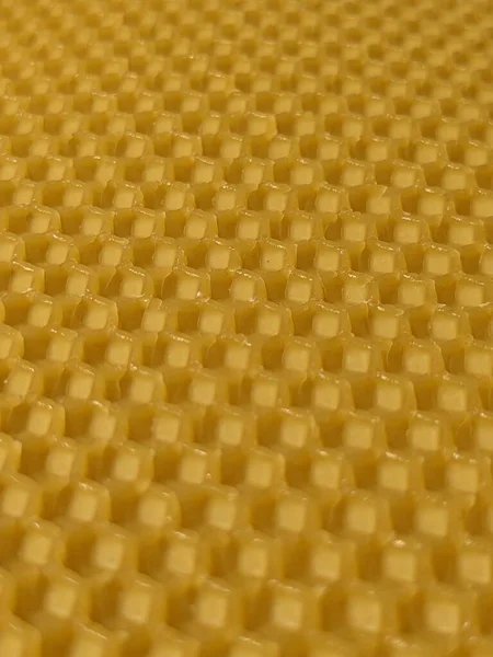 stock image abstract background or texture background of yellow wax honeycomb.Apiculture beekeeping