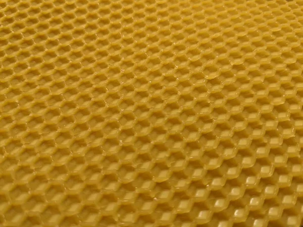 黄色の蜜蝋の抽象的な背景や質感の背景 養蜂の養液栽培 — ストック写真