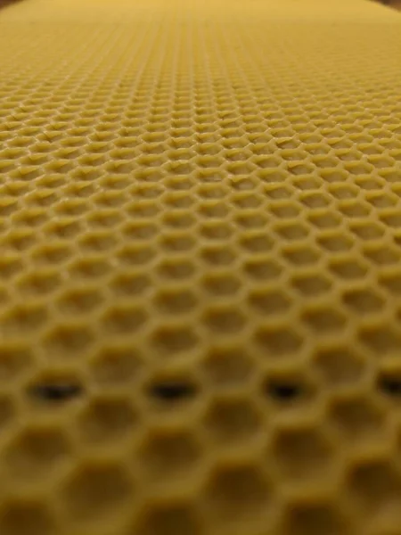 stock image abstract background or texture background of yellow wax honeycomb.Apiculture beekeeping