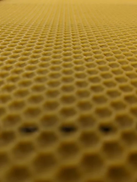 stock image abstract background or texture background of yellow wax honeycomb.Apiculture beekeeping