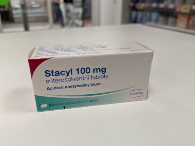 Prague, Czech Republic - July 13 2024: STACYL tablets with ACETYLSALICYLIC ACID active substance by STADA, used for pain relief, anti-inflammatory, and fever reduction. clipart