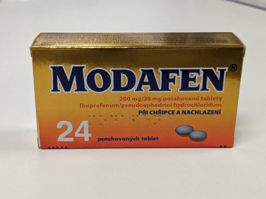 Prague, Czech Republic - July 10 2024: Modafen box of medication with ibuprofen and pseudoephedrine active substances by Zentiva, used for treatment of cold, flu, and sinus congestion. clipart