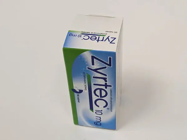 Stock image Prague, Czech Republic - July 10 2024: Zyrtec box of medication with cetirizine active substance by UCB, used for treatment of allergic rhinitis and chronic urticaria.