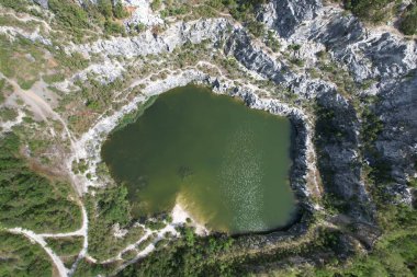 floded lime stone quarry by Rabi castle, Czech republic,Europe, aerial panorama landscape view