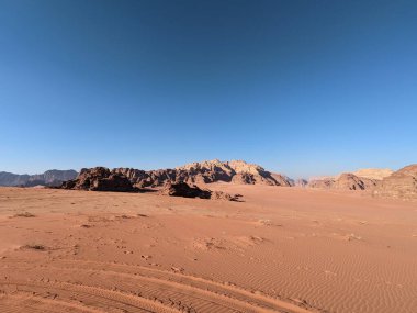 Wadi Rum Desert, Jordan. The red desert and Jabal Al Qattar mountain.Where some famous movies where shot,beautiful panorama scenic landscape view,beautiful sand dunes and sharp rocky mountains
