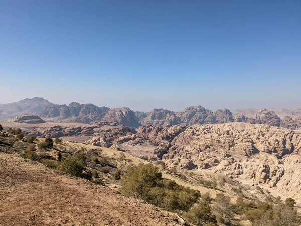 Desert landscape near ad-deir at beautiful sunset in Petra ruin and ancient city of Nabatean kingdom, Jordan, Arab, Asia, UNESCO World Heritage Site