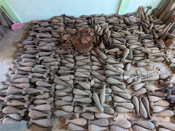 unexploded land mines and cluster bombs remains picked up all around Cambodia after war,now set in Museum of landmines in Siem Reap Cambodia, huge amount of ammunition is still laying in countryside