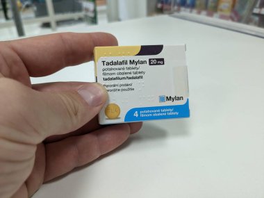 Cialis under generics drug name Tadalafil Mylan,used as an erectile dysfunction treatment and enlarged prostate therapy,active substance Tadalafil clipart