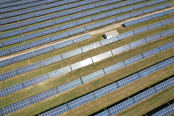 Aerial photo of solar power plant. Many solar energy panels in countryside from above. Photovoltaic power station near Prague, Czech republic, European union.Renewable energy sources-green deal