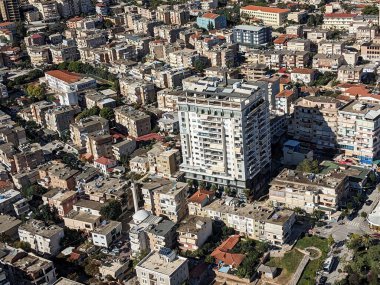 Sarande town Albania,Ionian Sea coast is renowned for its stunning landscapes and vibrant atmosphere.Aerial panorama views of the city reveal a picturesque blend of turquoise waters, sandy beaches clipart