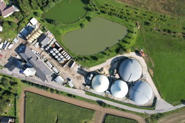 biogas production, biogas plants, bioenergy,aerial panorama landscape view of bio gas production facility and powerplant, European energy crisis,green renewable energy production clipart