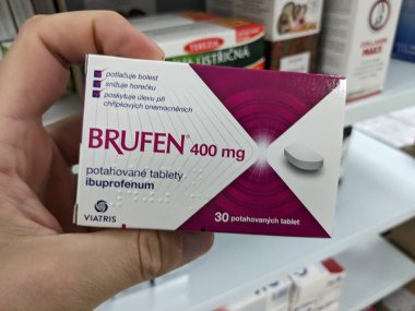 Prague, Czech Republic - July 10 2024: BRUFEN box of medication with IBUPROFEN active substance by ABBOTT, used for treatment of pain, inflammation, and fever. clipart