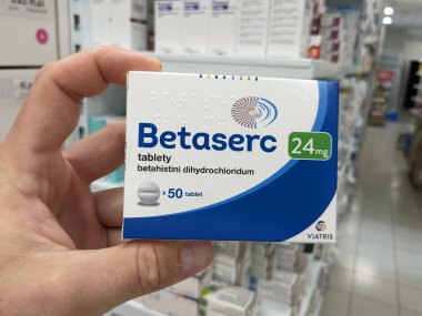 Prague, Czech Republic - July 10 2024: BETASERC box of medication with BETAHISTINE active substance by VIATRIS, used for treatment of vertigo and Meniere's disease. clipart