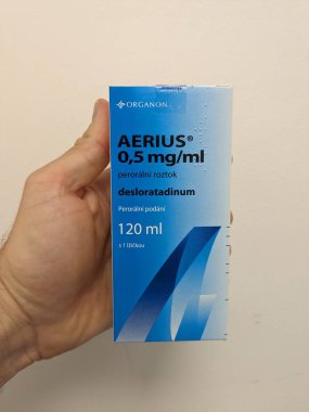 Prague,Czech Republic-October 9 2024:Aerius by MSD contains DESLORATADINE antihistamine used to relieve symptoms of allergic rhinitis, hay fever, and chronic urticaria, supporting allergy management clipart