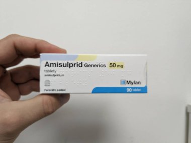 Prague, Czech Republic - SEPTEMBER 13 2024: AMISULPRID GENERICS box of medication with AMISULPRIDE active substance by GENERICS, used for treatment of schizophrenia. clipart