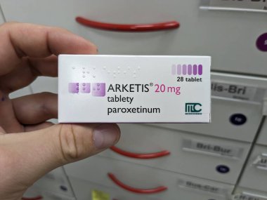 Prague, Czech Republic - July 10 2024: ARKETIS box of medication with PAROXETINE active substance by KRKA, used for treatment of depression, anxiety disorders, and OCD. clipart