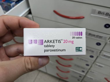 Prague, Czech Republic - July 10 2024: ARKETIS box of medication with PAROXETINE active substance by KRKA, used for treatment of depression, anxiety disorders, and OCD. clipart