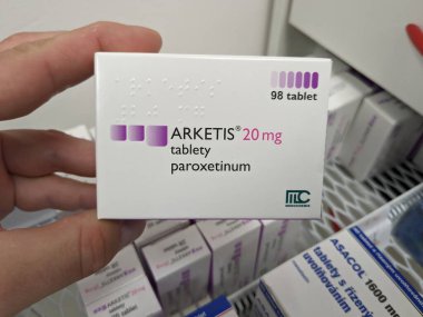 Prague, Czech Republic - July 10 2024: ARKETIS box of medication with PAROXETINE active substance by KRKA, used for treatment of depression, anxiety disorders, and OCD. clipart