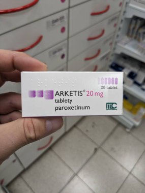 Prague, Czech Republic - July 10 2024: ARKETIS box of medication with PAROXETINE active substance by KRKA, used for treatment of depression, anxiety disorders, and OCD. clipart