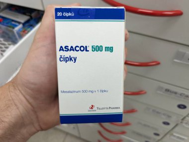 Prague, Czech Republic -December 10 2024: ASACOL box of medication with MESALAZINE active substance by TILLOTTS PHARMA, used for treatment of ulcerative colitis and Crohn's disease. clipart