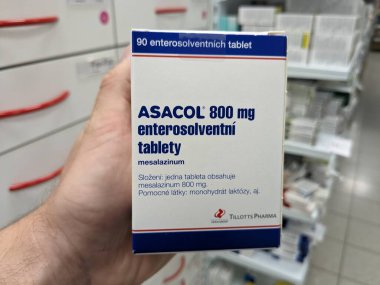 Prague, Czech Republic -December 10 2024: ASACOL box of medication with MESALAZINE active substance by TILLOTTS PHARMA, used for treatment of ulcerative colitis and Crohn's disease. clipart