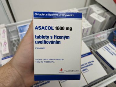 Prague, Czech Republic -December 10 2024: ASACOL box of medication with MESALAZINE active substance by TILLOTTS PHARMA, used for treatment of ulcerative colitis and Crohn's disease. clipart