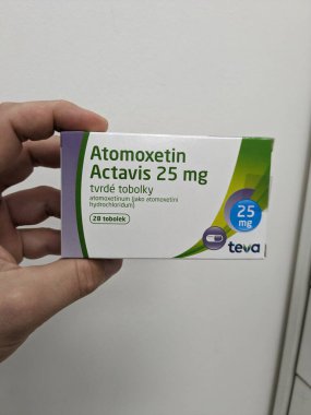 Prague, Czech Republic-July 9 2024: Atomoxetin Actavis box of medication with Atomoxetine active substance by Mylan, used for treatment of ADHD, attention deficit hyperactivity disorder, impulse contr clipart