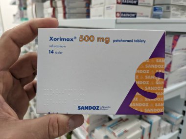 Prague, Czech Republic - July 9 2024: XORIMAX box of tablets with CEFUROXIME active substance by SANDOZ, used for treatment of bacterial infections. clipart