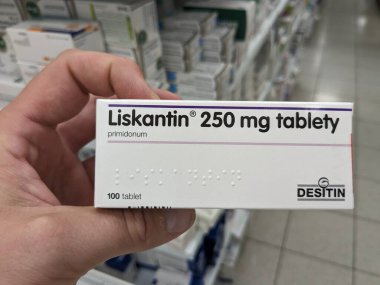 Prague, Czech Republic - July 10 2024: LISKANTIN box of medication with PHENYTOIN active substance by DESITIN, used for treatment of epilepsy and seizure control. clipart