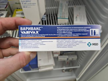 Prague, Czech Republic - July 10 2024: VARIVAX box of medication with VARICELLA VACCINE active substance by MERCK, used for prevention of chickenpox. clipart