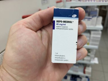 Prague, Czech Republic - JULY 10 2024: Depo-Medrol box of medication with methylprednisolone acetate active substance by Pfizer, used for treatment of inflammation, arthritis, lupus, and allergic diso clipart