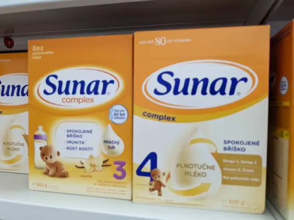 stock image Prague, Czech Republic - July 9 2024: SUNAR box of infant formula with DHA and PREBIOTICS active substances by HERO, used for baby nutrition.