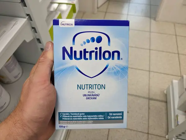 Stock image Prague, Czech Republic - July 9 2024: NUTRILON NUTRITON box of thickening agent with active substance by NUTRICIA, used for treatment of infant reflux and feeding difficulties.