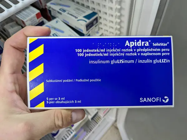 stock image Prague, Czech Republic - July 10 2024: APIDRA SOLOSTAR box of medication with INSULIN GLULISINE active substance by SANOFI, used for treatment of diabetes and blood sugar control.