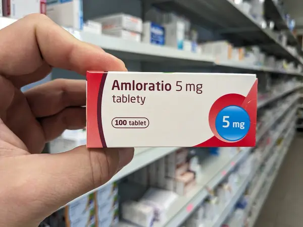 Stock image Prague, Czech Republic - July 9 2024: AMLORATIO box of tablets with AMLODIPINE active substance by SANDOZ, used for treatment of hypertension and angina.