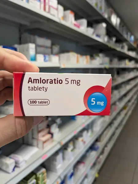 Stock image Prague, Czech Republic - July 9 2024: AMLORATIO box of tablets with AMLODIPINE active substance by SANDOZ, used for treatment of hypertension and angina.