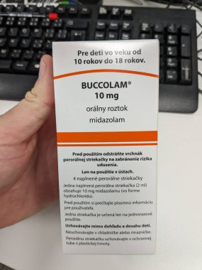 Prague, Czech Republic - JULY 10 2024: Buccolam box of medication with midazolam active substance by Neuraxpharm, used for treatment of prolonged acute convulsive seizures in children and adolescents. clipart