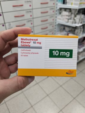 Prague, Czech Republic - JULY 10 2024: Methotrexat Ebewe box of medication with methotrexate active substance by Ebewe Pharma, used for treatment of rheumatoid arthritis, psoriasis, and certain types  clipart