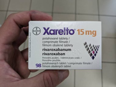 Prague, Czech Republic - July 10 2024: XARELTO box of medication with RIVAROXABAN active substance by BAYER, used for treatment of blood clot prevention and stroke prevention. clipart