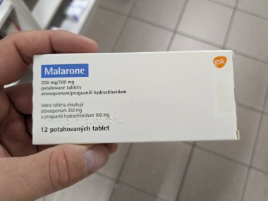 Prague, Czech Republic - July 10 2024: MALARONE box of medication with ATOVAQUONE and PROGUANIL active substances by GLAXOSMITHKLINE, used for prevention and treatment of malaria. clipart