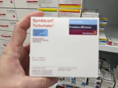 Prague, Czech Republic - July 10 2024: SYMBICORT TURBUHALER box of medication with BUDESONIDE and FORMOTEROL active substances by ASTRAZENECA, used for treatment of asthma and COPD. clipart