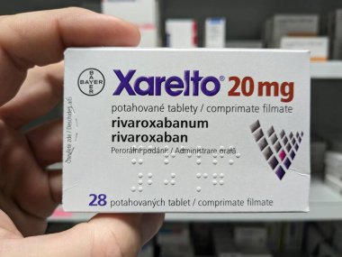 Prague, Czech Republic - July 10 2024: XARELTO box of medication with RIVAROXABAN active substance by BAYER, used for prevention and treatment of blood clots. clipart