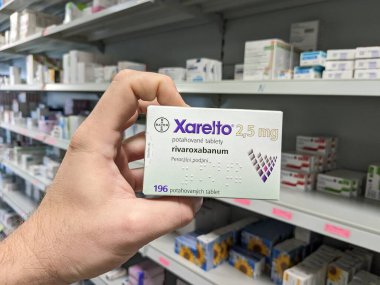 Prague, Czech Republic - July 10 2024: XARELTO box of medication with RIVAROXABAN active substance by BAYER, used for prevention and treatment of blood clots. clipart