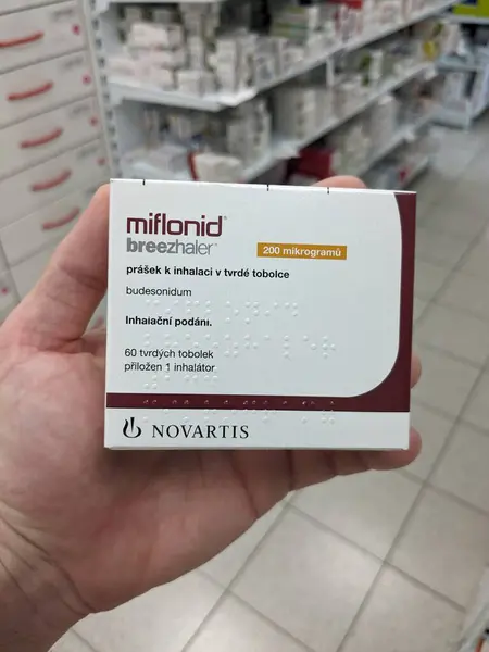 stock image Prague, Czech Republic - July 9 2024: MIFLONID box of medication with budesonide active substance by Chiesi, used for treatment of asthma, chronic obstructive pulmonary disease, inflammation.