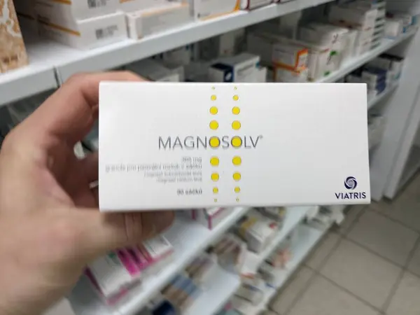 stock image Prague, Czech Republic - July 9 2024: MAGNOSOLV box of sachets with MAGNESIUM CITRATE active substance by VERLA-PHARM, used for muscle cramps and fatigue.